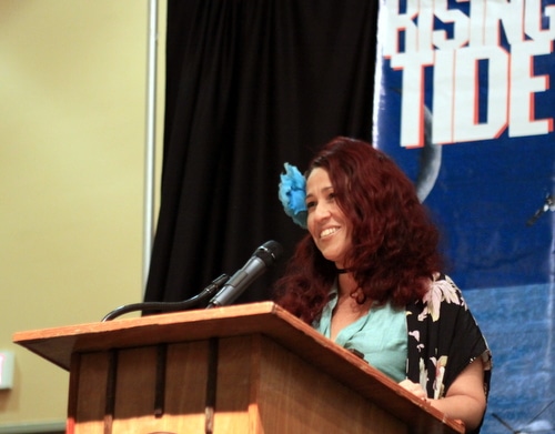 Deb Cotton accepts Rising Tide's annual Ashley Morris award. (Robert Morris, UptownMessenger.com)
