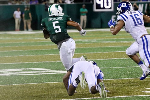 Tulane wide receiver Terren Encalade jukes a would-be tackler in the season opening game against Duke. (Zach Brien, UptownMessenger.com)