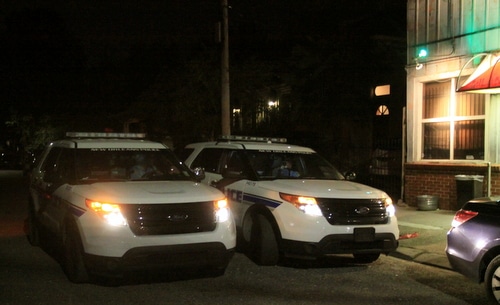 Two NOPD patrol units confer on Milan Street after speaking to witnesses near the Milan Lounge. (Robert Morris, UptownMessenger.com)