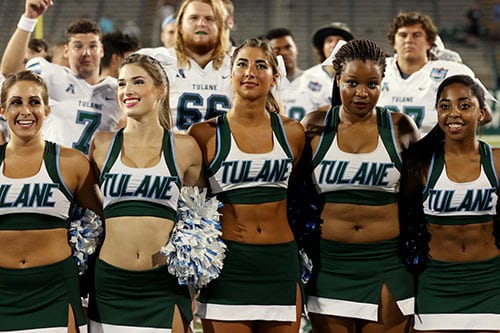 Tulane cheerleaders and players locked together arm-in-arm to sing the Alma Mater after Saturday's victory. (Zach Brien, UptownMessenger.com)