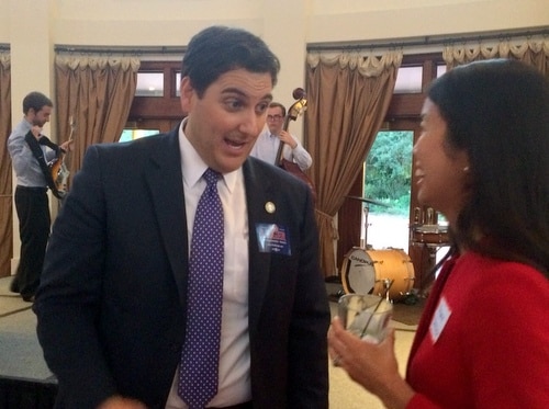 Walt Leger speaks to a supporter at his recent fundraiser. (photo by Danae Columbus for UptownMessenger.com)