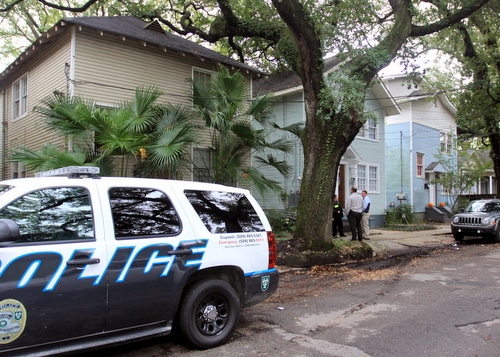 New Orleans Police detectives confer with Tulane police officers on Wednesday afternoon in the 7500 block of Willow. A home invasion was reported there, but has not been confirmed. (Robert Morris, UptownMessenger.com)
