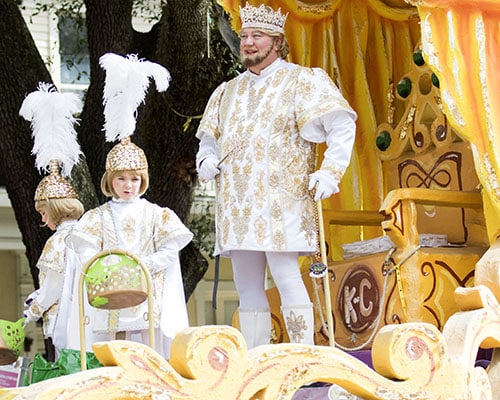 King Carrollton XCII, Lee Cotaya, leads the way for the Krewe of Carrollton down Napoleon Avenue on Sunday. The Krewe of Carrollton was one of four parades that rolled uptown on Sunday. (Zach Brien, UptownMessenger.com)
