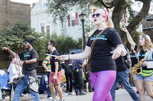 Members of the Tulane Soundwaves sing their way down Napoleon avenue during the King Arthur parade. King Arthur was one of four parades that rolled uptown on Sunday. (Zach Brien, UptownMessenger.com)