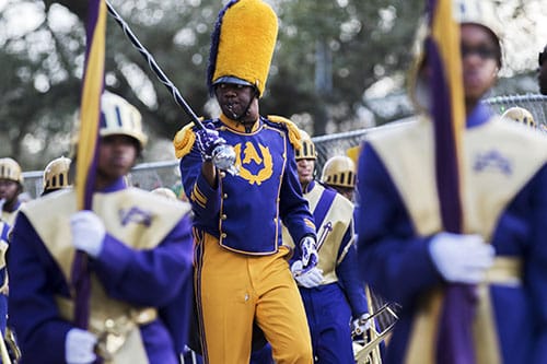 St. Augustine high school marching band gears up after a break in the parade during the Krewe of Alla. The Krewe of Alla was one of four parades to roll Sunday afternoon Uptown. (Zach Brien, UptownMessenger.com)