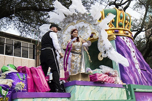 The queen of Alla, Lauren "Fleurty Girl" LeBlanc, throws beads from her float. The Krewe of Alla was one of four parades to roll Sunday afternoon Uptown. (Zach Brien, UptownMessenger.com)