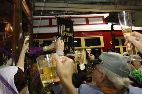 Masked revelers welcome in Carnival season 2016 in the Willow street streetcar barn before the Phunny Phorty Phellows embark on their annual ride. The event takes place on 12th night, 12 days after Christmas and is the first parade of Carnival season in New Orleans. (Zach Brien, UptownMessenger.com)