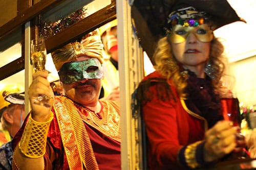 Masked members of the Phunny Phorty Phellows embark on their annual ride from the Willow street barn down the St. Charles avenue streetcar line. The event takes place on 12th night, 12 days after Christmas and is the first parade of Carnival season in New Orleans. (Zach Brien, UptownMessenger.com)