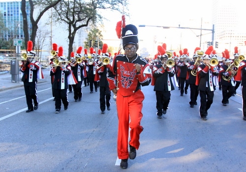 The Martin Luther King Charter School band marches on Loyola Avenue. (Robert Morris, UptownMessenger.com)