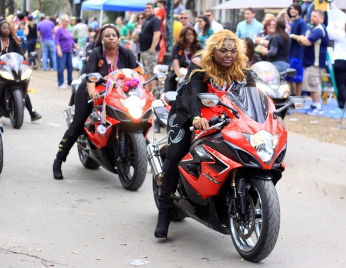 A motorcycle group rolls with the Mystic Krewe of Femme Fatale on St. Charles Avenue. (Robert Morris, UptownMessenger.com)