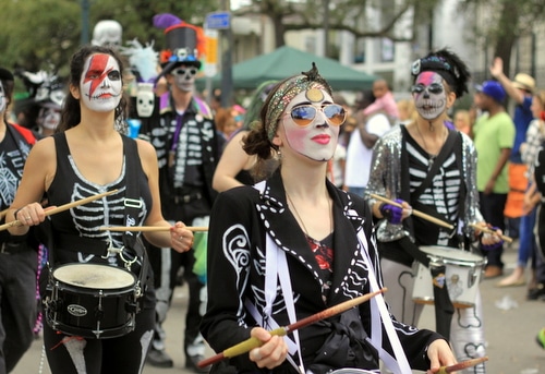 The Skinz N Bonez gang marches as the Mystic Krewe of Femme Fatale rolls on St. Charles Avenue. (Robert Morris, UptownMessenger.com)