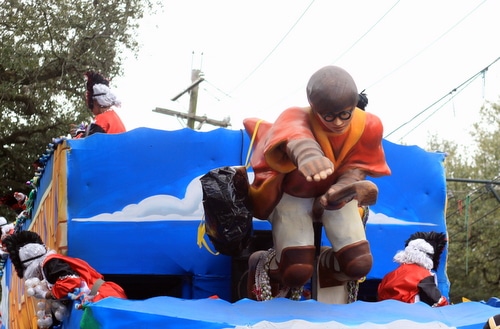 Harry Potter flies at the front of a float as the Mystic Krewe of Femme Fatale rolls on St. Charles Avenue. (Robert Morris, UptownMessenger.com)