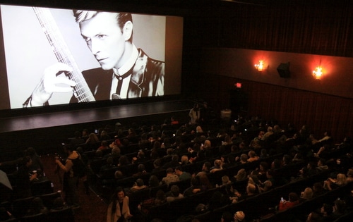 Another iconic Bowie visage gazes over the Prytania audience. (Robert Morris, UptownMessenger.com)