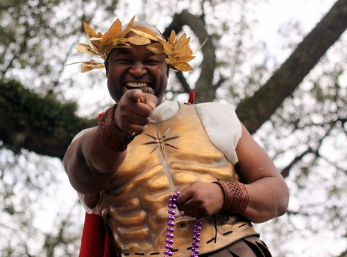 City Councilman Jason Williams rides the Krewe of Freret parade on Napoleon Avenue. (Robert Morris, UptownMessenger.com)