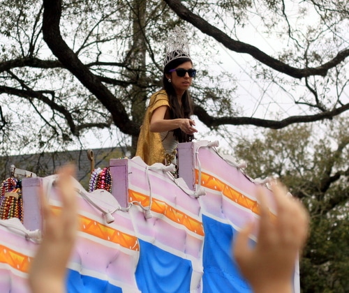 Ana Ochoa rides as the queen of the Krewe of Freret parade on Napoleon Avenue. (Robert Morris, UptownMessenger.com)