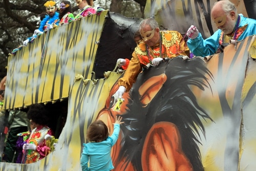 The Krewe of Freret parade rolls on Napoleon Avenue. (Robert Morris, UptownMessenger.com)