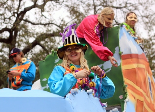 The Krewe of Freret parade rolls on Napoleon Avenue. (Robert Morris, UptownMessenger.com)
