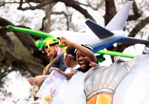 The Krewe of Freret parade rolls on Napoleon Avenue. (Robert Morris, UptownMessenger.com)