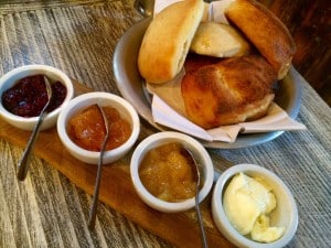 Tin of Housemade Biscuits with Peach Rosemary, Port Strawberry, and Pineapple Sage Jams (Kristine Froeba)
