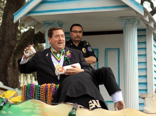 Lt. Gov. Billy Nungesser throws cups from his float in the Krewe of Choctaw parade on Napoleon Avenue. (Robert Morris, UptownMessenger.com)