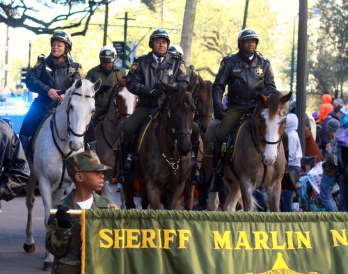 Sheriff Marlin Gusman and City Councilwoman LaToya Cantrell ride on horseback in the Zulu parade. (Robert Morris, UptownMessenger.com)