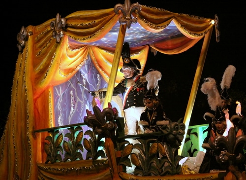 The Dictator, Richard XX, greets the crowd as Le Krewe d'Etat rolls on Napoleon Avenue. (Robert Morris, UptownMessenger.com)