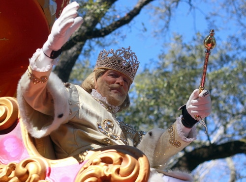 The king of Rex, Michael W. Kearney, greets his subjects on St. Charles Avenue. (Robert Morris, UptownMessenger.com)
