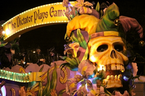 The title float in Le Krewe d'Etat rolls on Napoleon Avenue. (Robert Morris, UptownMessenger.com)