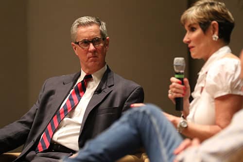 Clancy Dubos, left, Gambit editor and columnist, listens to Mary Matalin, right, speak in Rousell Hall at Loyola University as part of the Ed Renwick lecture series. Carville, a Democrat, and Matalin, a Conservative, are two prominent speakers in their respective political circles. (Zach Brien, UptownMessenger.com)