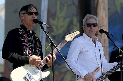Rick Olivier, left, and Rob Savoy, right, lead the Creole String Beans on the Alder Hotel stage at the 2016 Freret Street Festival. The event featured 18 artists on three stages, 35 food vendors and craft vendors ranging from Freret and Soniat to Napoleon Avenue. (Zach Brien, UptownMessenger.com)