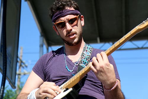 Robert Hinson of Sexual Thunder solos on his guitar at the Loyola University stage at the 2016 Freret Street Festival. The event featured 18 artists on three stages, 35 food vendors and craft vendors ranging from Freret and Soniat to Napoleon Avenue. (Zach Brien, UptownMessenger.com)