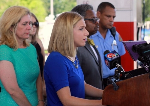 Elizabeth Fried, fiancee of Thomas Rolfes, speaks to reporters at a news conference hosted by CrimeStoppers on the one-month anniversary of Rolfes' death. (Robert Morris, UptownMessenger.com)