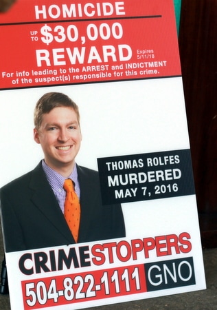 A poster announces the $30,000 reward for information relating to the May 7 shooting death of Thomas Rolfes. (Robert Morris, UptownMessenger.com)