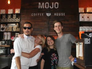 Mojo Coffee Roasters’ Demian Estevez and Debra Dunn (left) of Ignatius Espresso Bar & Cafe celebrated Mojo’s 10 year anniversary in May. (Courtesy of Mojo Coffee Roasters)