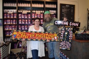 Aubrey Miller of PJ's Coffee with artist Simon of New Orleans (via StayLocal)