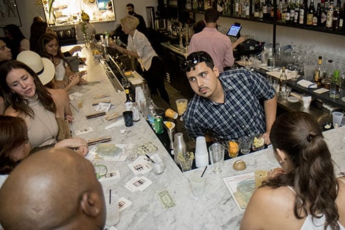 Carlos Quinonez serves up signature cocktails at Bar Frances as part of Tales of the Cocktail. The event, Freret Street Sunday, included bars and restaurants up and down the street. (Zach Brien, UptownMessenger.com)