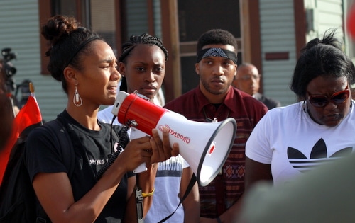 Angela Kinlaw speaks during a rally demanding justice for Eric Harris. (Robert Morris, UptownMessenger.com)