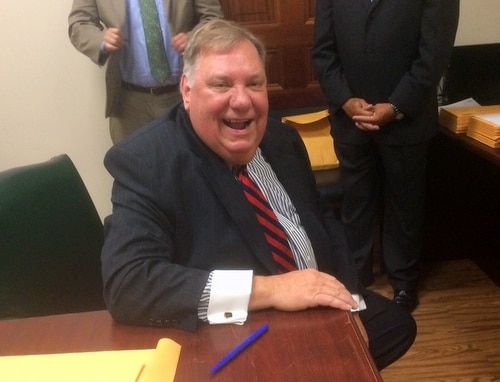Paul Bonin shares a chuckle after qualifying to run for Criminal District Court. (photo by Danae Columbus for UptownMessenger.com)
