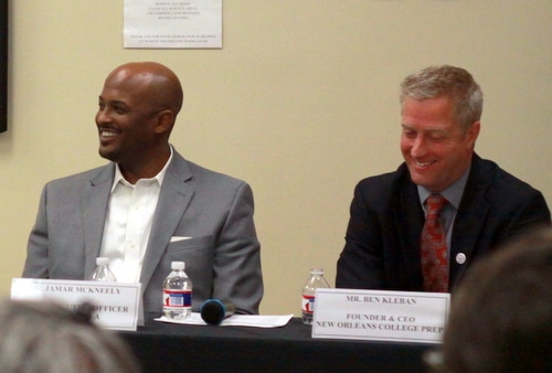Ben Kleban (left), founder of NOLA College Prep, and Jamar McKneely, CEO of Inspire NOLA charter schools, share a laugh during an April 20 forum on school unification hosted by 100 Black Men of New Orleans. (UptownMessenger.com file photo by Robert Morris)