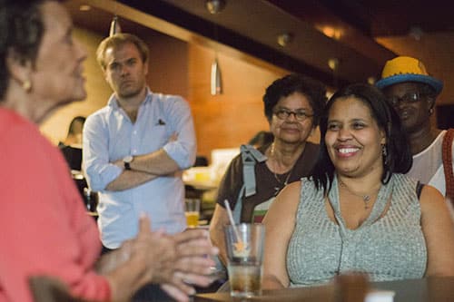 Dawn Butler listens to Sybil Morial discuss her memoir, Witness to Change. Morial read selections from her book and signed copies at Poseidon restaurant on Saint Charles avenue. (Zach Brien, UptownMessenger.com)