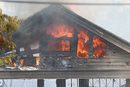 A fire is underway on the 4220 block of S. Rocheblave in Broadmoor. It is a 3-alarm fire and has consumed 2 homes on the block. (Zach Brien, UptownMessenger.com)