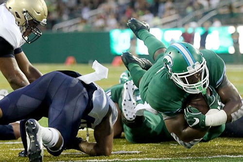 Tulane running back Josh Rounds dives for a touchdown. Navy defeated Tulane 21-14 at Yulman Stadium. (Zach Brien, UptownMessenger.com)