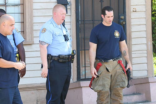 NOPD and NOFD members examine the site of a murder on Josephine and Willow street in Central City. (Zach Brien, UptownMessenger.com)