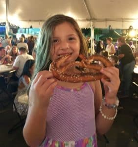 Five year old Ava Montalbano, Pretezl Afficiandao and student at Kenner Discovery Riverotwn Campus waited 45 minutes for her Pretzel. Verdict: Worth It! (Kristine Froeba)