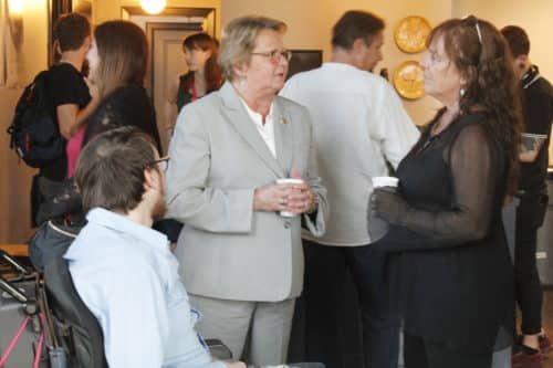 Jesse Bascle (left) speaks to Susan Guidry and his mother Sue Ford (right) at the "Jonah Stands Up" pre-screening party at the Ace Hotel. (Jamal Melancon, Gentilly Messenger)