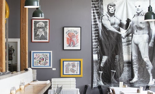 Luchadore tapestry and local art at Midway Pizza